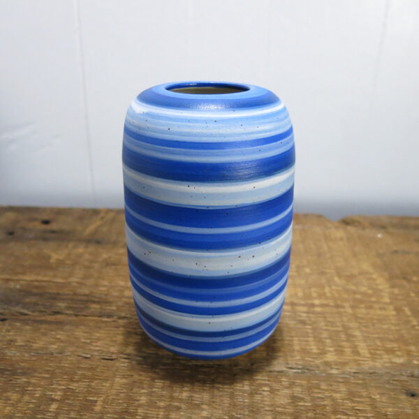 Ceramic vase with blue stripes.