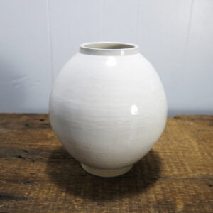White ceramic vase.
